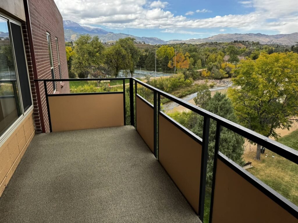 Private balcony at Park Manor with views of Pikes Peak, Monument Creek and Monument Valley Park